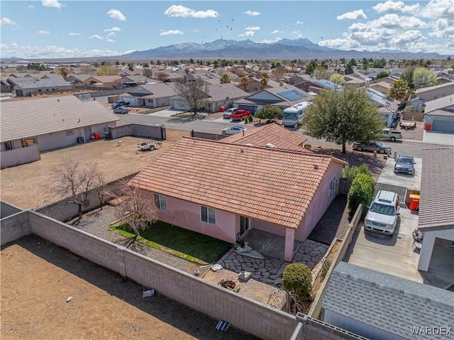 bird's eye view featuring a residential view and a mountain view