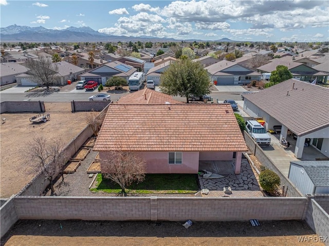 bird's eye view featuring a mountain view and a residential view