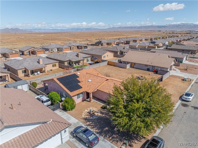 drone / aerial view with a mountain view and a residential view