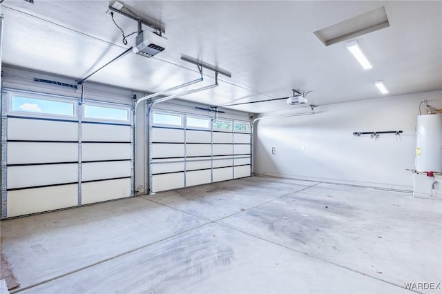 garage with water heater and a garage door opener