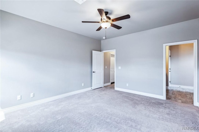 unfurnished bedroom featuring baseboards, ceiling fan, and carpet