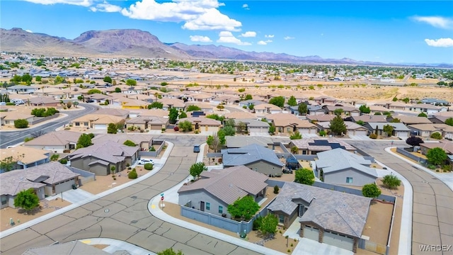 birds eye view of property with a residential view and a mountain view