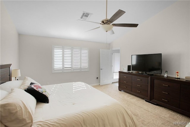 bedroom with lofted ceiling, ceiling fan, light colored carpet, visible vents, and baseboards