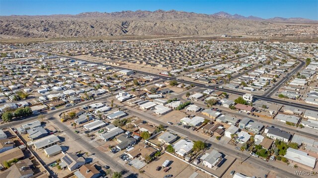 drone / aerial view with a residential view and a mountain view