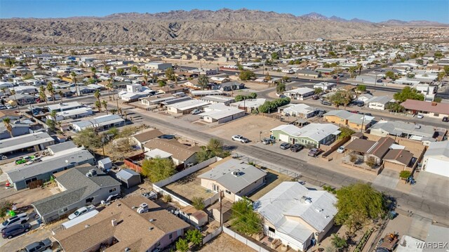 bird's eye view with a residential view and a mountain view