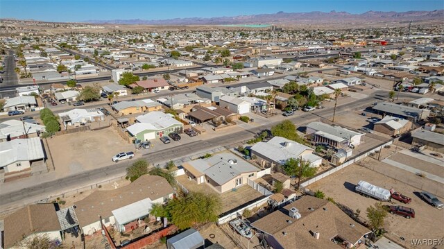 drone / aerial view with a residential view and a mountain view