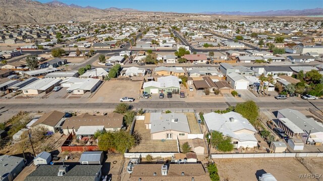 birds eye view of property featuring a residential view and a mountain view