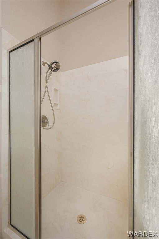 full bathroom featuring a stall shower