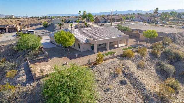 aerial view featuring a mountain view and a residential view