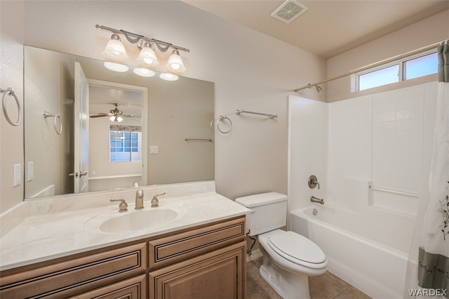 bathroom with toilet, vanity, visible vents, tile patterned floors, and shower / bathtub combination with curtain