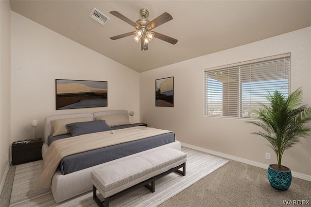 bedroom with baseboards, visible vents, vaulted ceiling, and carpet flooring