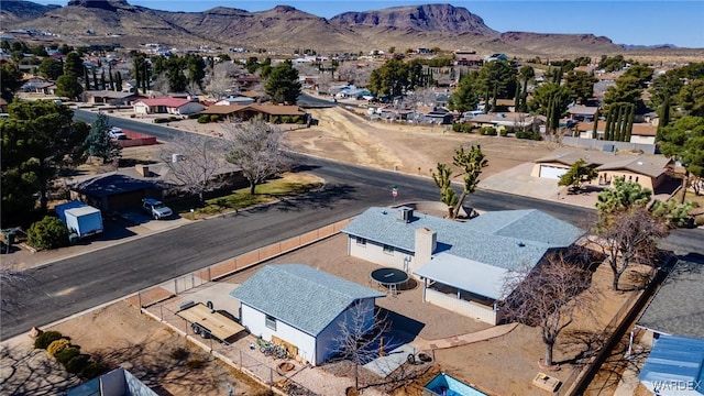 bird's eye view featuring a residential view and a mountain view