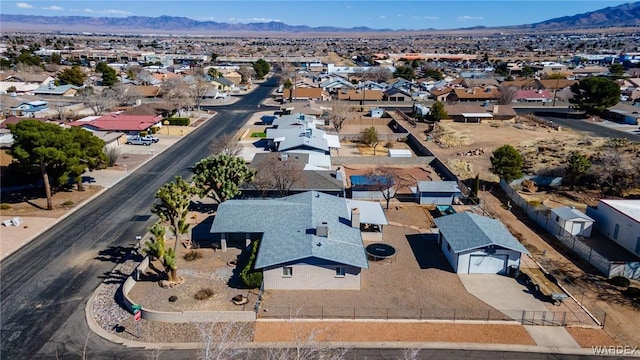 aerial view featuring a mountain view and a residential view