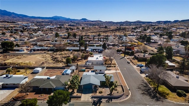 birds eye view of property with a residential view and a mountain view