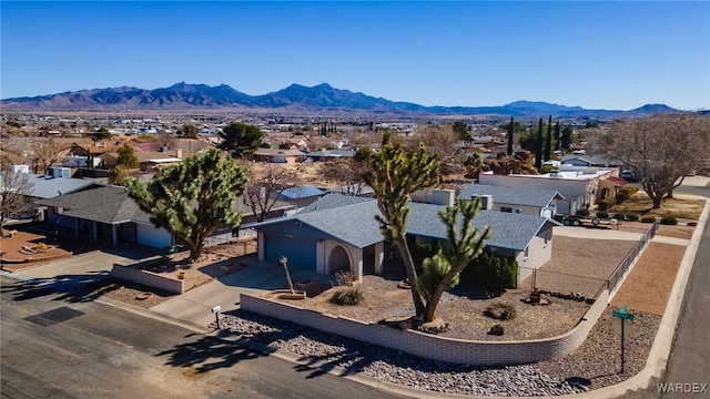 birds eye view of property featuring a residential view and a mountain view