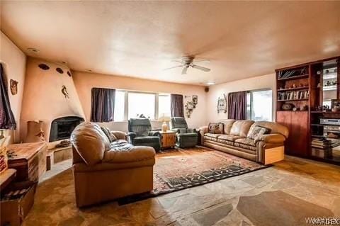 living room featuring ceiling fan