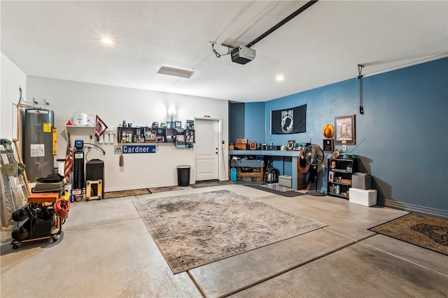 2602 Bear Mountain Loop, Bullhead City, AZ 86442 - garage featuring water heater, a garage door opener, and recessed lighting
