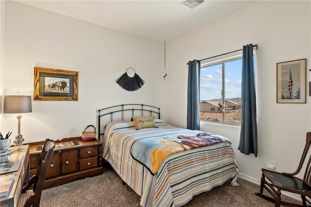 2602 Bear Mountain Loop, Bullhead City, AZ 86442 - bedroom with dark colored carpet and an office area