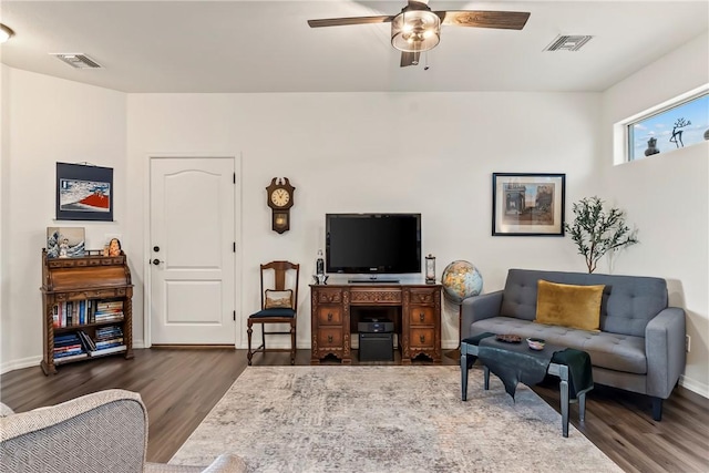 2602 Bear Mountain Loop, Bullhead City, AZ 86442 - living area with wood finished floors, ceiling fan, and baseboards