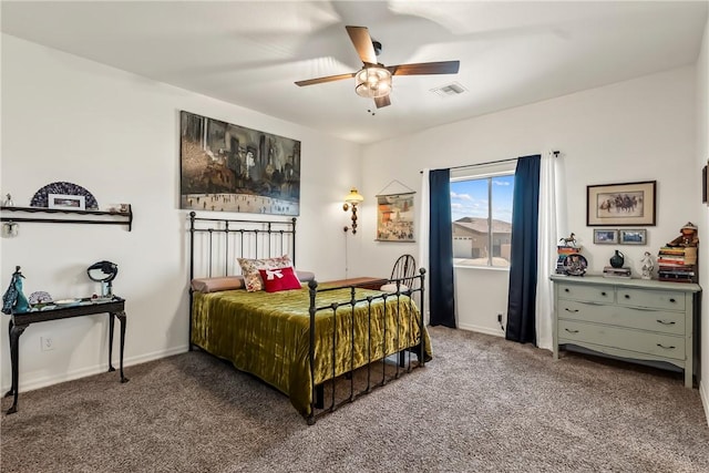 2602 Bear Mountain Loop, Bullhead City, AZ 86442 - bedroom with carpet, baseboards, and ceiling fan
