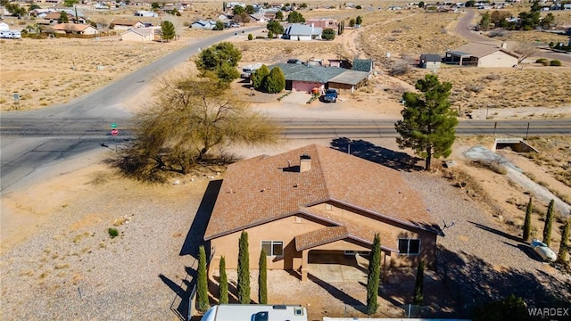 bird's eye view with a desert view