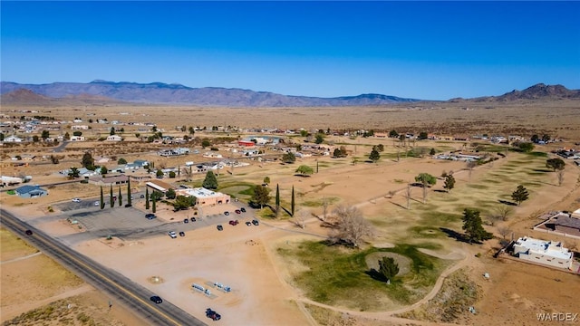 aerial view with a mountain view and view of desert