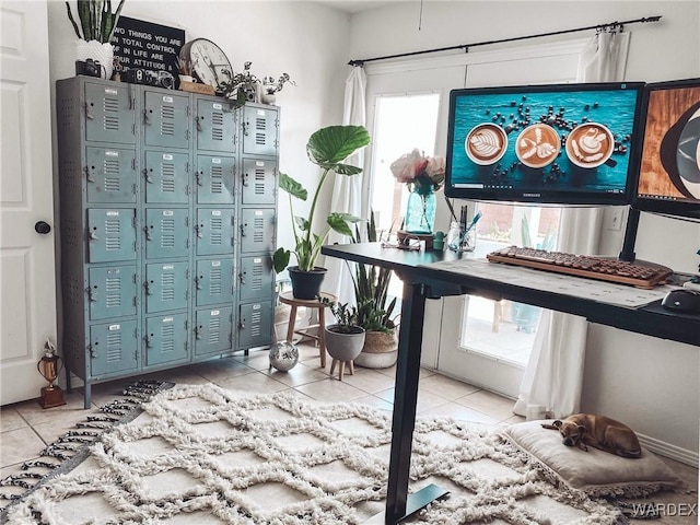 miscellaneous room with tile patterned floors