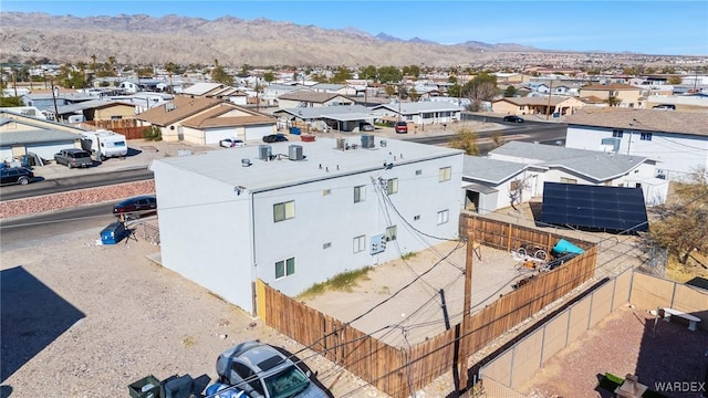 birds eye view of property featuring a residential view and a mountain view