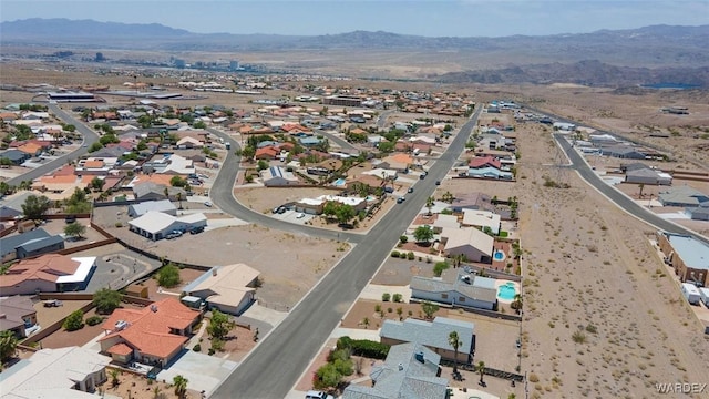 birds eye view of property featuring a residential view and a mountain view