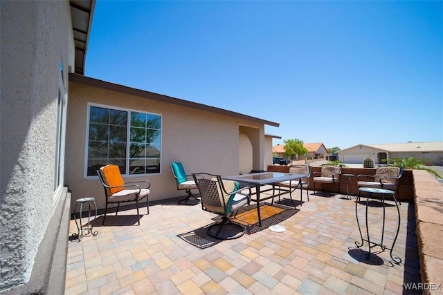 view of patio with outdoor dining space