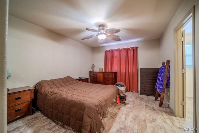 bedroom featuring ceiling fan