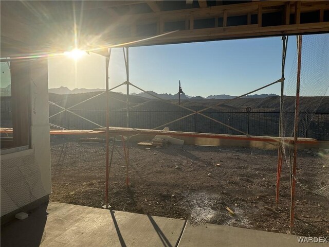 view of yard with a fenced backyard and a mountain view