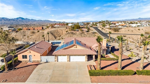 bird's eye view with a residential view and a mountain view