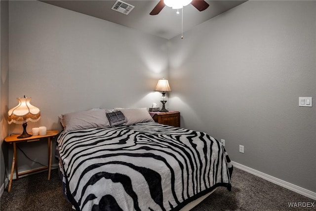 bedroom featuring dark colored carpet, a ceiling fan, visible vents, and baseboards