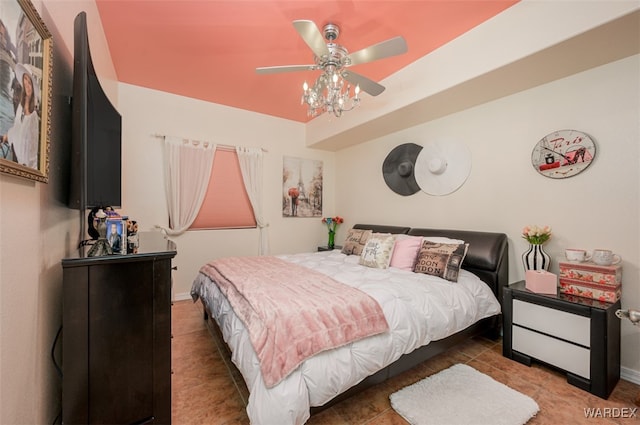 bedroom featuring a closet and a notable chandelier
