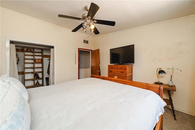 bedroom featuring carpet flooring, ceiling fan, and crown molding