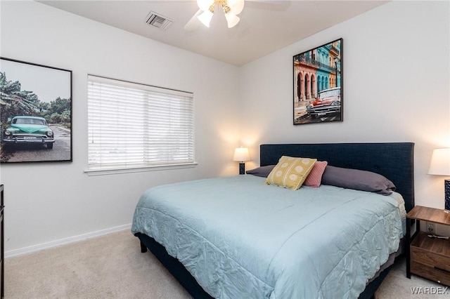 bedroom with a ceiling fan, carpet, visible vents, and baseboards