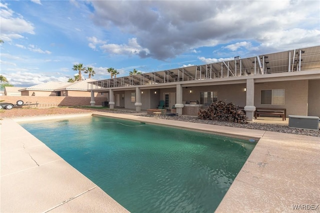 view of pool featuring a fenced in pool and a patio