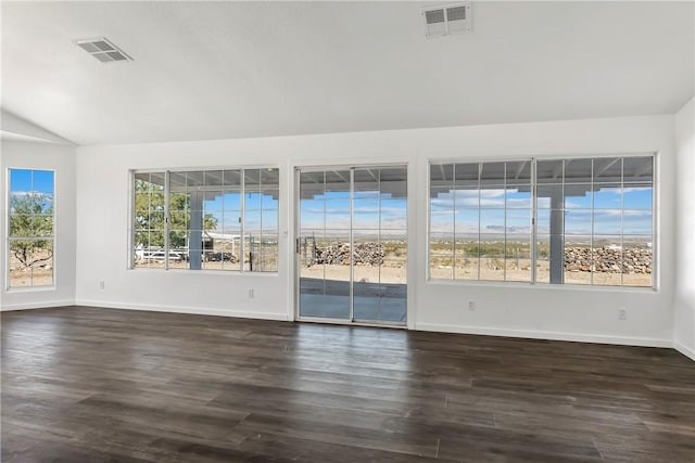15565 Iron Dr, Dolan Springs, AZ 86441 - spare room with lofted ceiling and dark wood finished floors