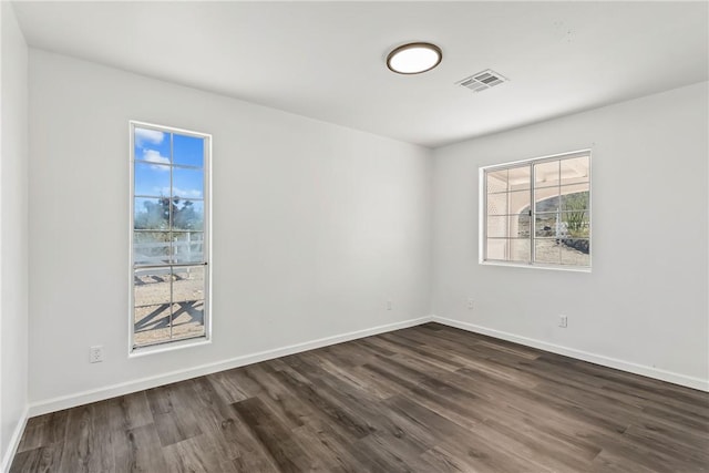 15565 Iron Dr, Dolan Springs, AZ 86441 - spare room with dark wood-type flooring
