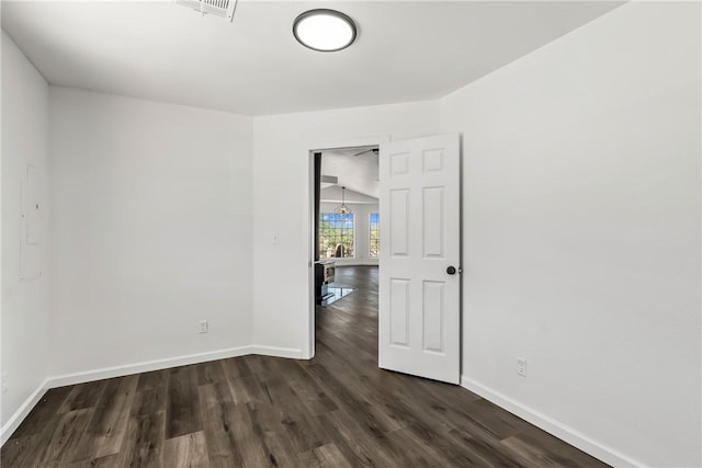 15565 Iron Dr, Dolan Springs, AZ 86441 - spare room featuring dark wood-style floors and a ceiling fan