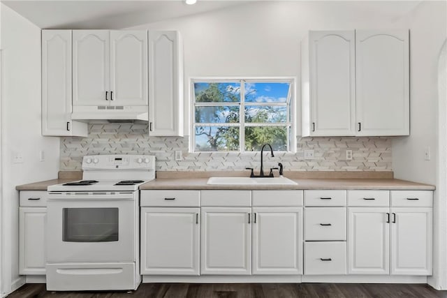 15565 Iron Dr, Dolan Springs, AZ 86441 - kitchen featuring white range with electric stovetop, under cabinet range hood, white cabinetry, decorative backsplash, and recessed lighting