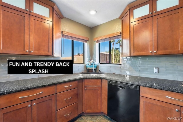 kitchen featuring a sink, glass insert cabinets, dark stone counters, and dishwasher