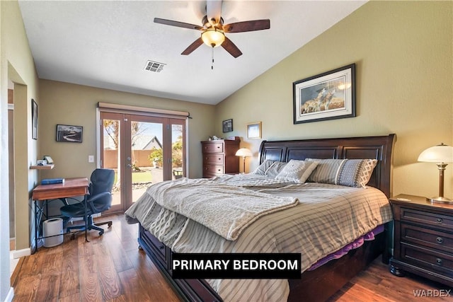 bedroom with vaulted ceiling, dark wood-style flooring, visible vents, and access to exterior