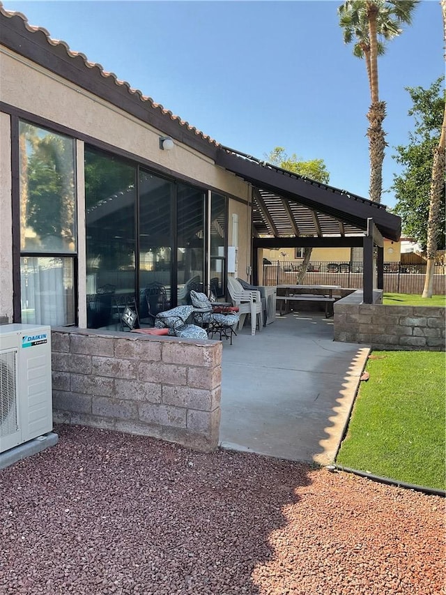 201 Riverfront Drive, Drive, Bullhead City, AZ 86442 - view of patio / terrace featuring a cooling unit and fence