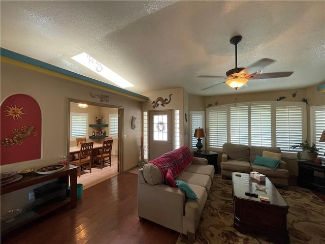 2405 N Clack Canyon Rd, Kingman, AZ 86409 - living room with a textured ceiling, wood finished floors, and ceiling fan