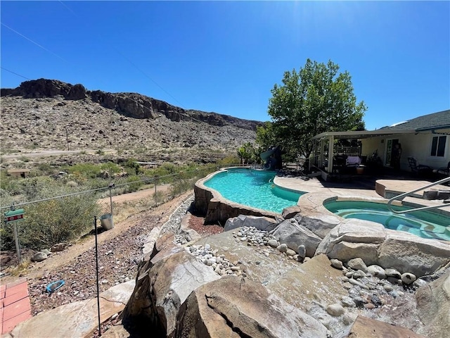 2405 N Clack Canyon Rd, Kingman, AZ 86409 - outdoor pool featuring a patio and a mountain view