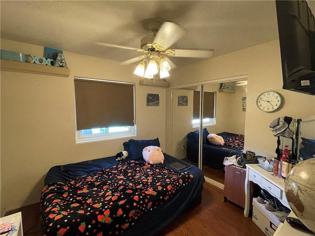 2405 N Clack Canyon Rd, Kingman, AZ 86409 - bedroom featuring wood finished floors, a ceiling fan, and a closet