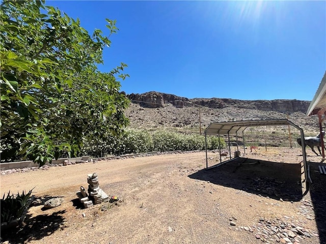 2405 N Clack Canyon Rd, Kingman, AZ 86409 - view of yard featuring a mountain view and a carport