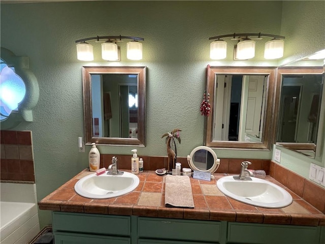 2405 N Clack Canyon Rd, Kingman, AZ 86409 - bathroom featuring double vanity and a bath